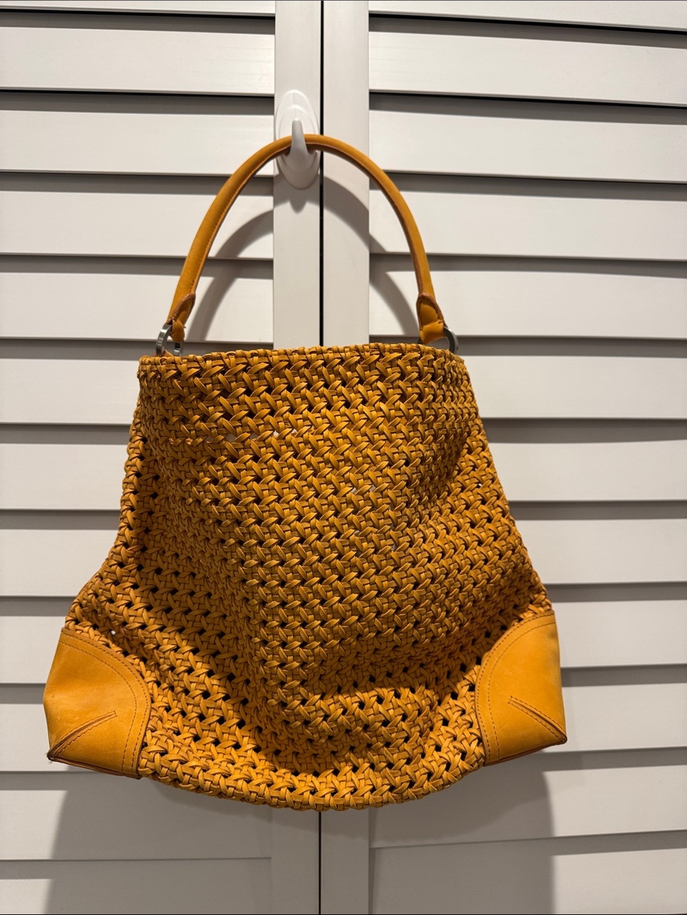 Ann Taylor Orange Woven Leather-Trim Shoulder Bag with magnetic closure.